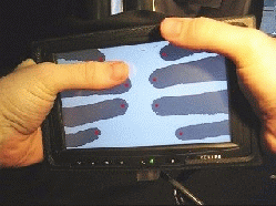 Die Finger werden als Schatten angezeigt, der rote Punkt ist die aktive Zone (Foto: merl.com)
