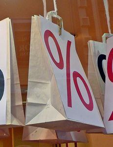 Prozent: Einzelhändler setzen auf Rabattcoupons (Foto: pixelio.de/G)