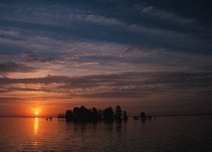 Sonnenuntergang: Küsten besonders bedroht (Foto: flickr.com/US Geolocial Survey)