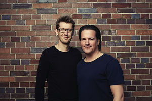 Jürgen Holler und Christian Vieira dos Santos optimieren Bürowelten (© Symbios)