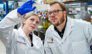 Josh Koenig (right) and assistant Alyssa Phelps examine samples (Photo: mcmaster.ca)